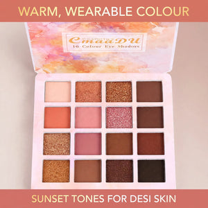 Eyeshadow palette shades close-up – warm sunset tones, mattes and metallics