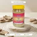 SCS Mud & Kojic Acid Powder Face Mask — Authentic SCS Product Packshot with Yellow Lid on Luxury Marble Pedestal